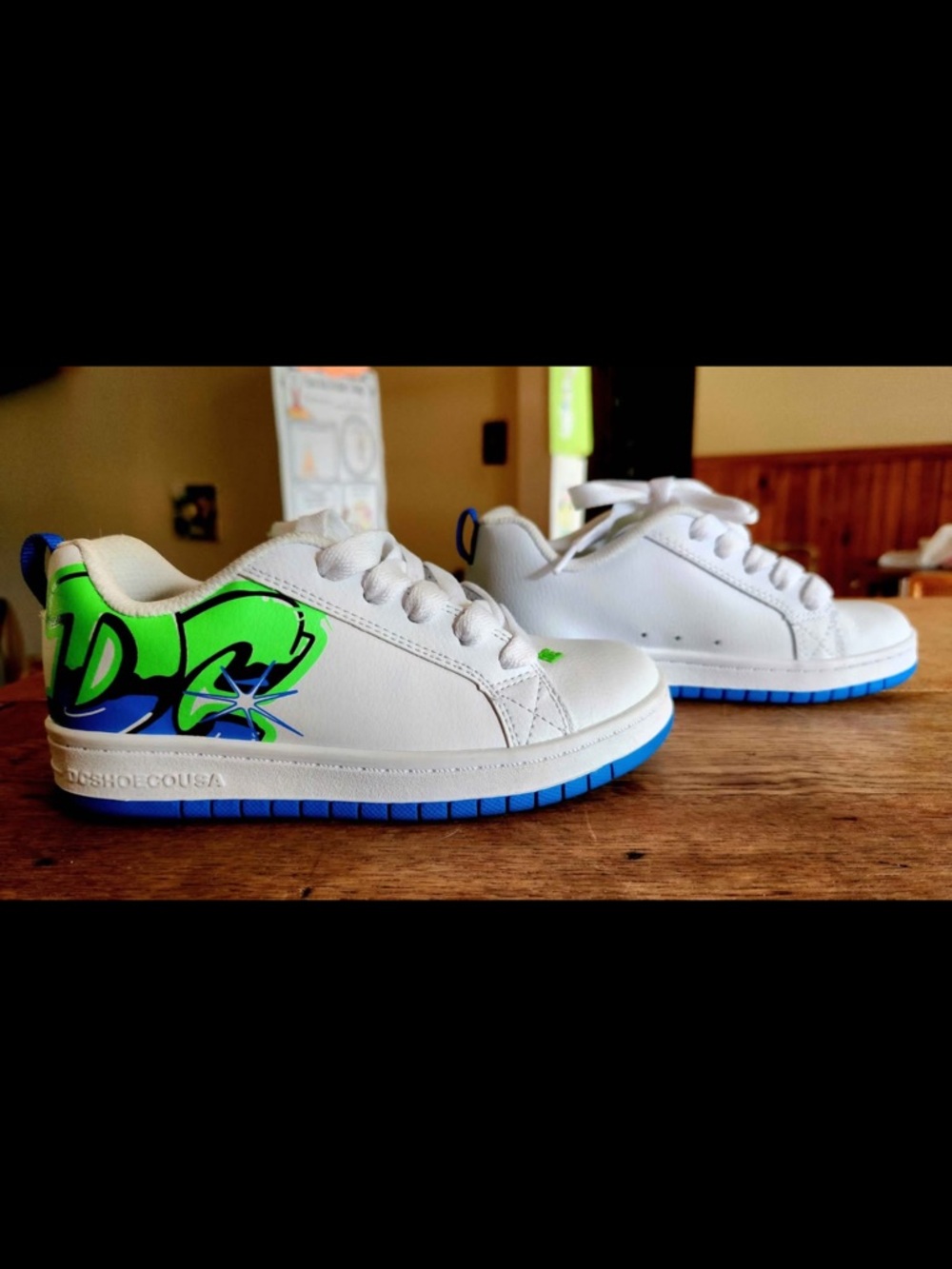 DC Kids White Sneakers with Blue Sole and Green Graphic Accent